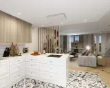 Aménager une cuisine ouverte avec un îlot central, des placards en bois clair et un salon attenant. Le sol est décoré de carreaux graphiques.