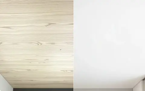 Le lambris en bois clair est recouvert d'enduit blanc, transformant l'espace.