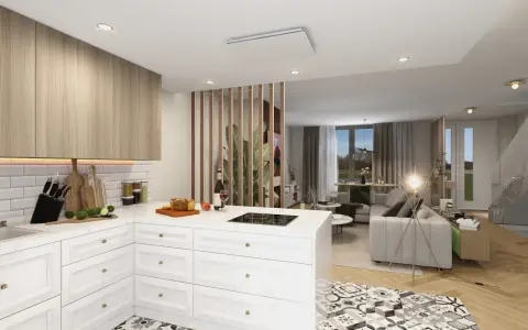 Aménager une cuisine ouverte avec un îlot central, des placards en bois clair et un salon attenant. Le sol est décoré de carreaux graphiques.