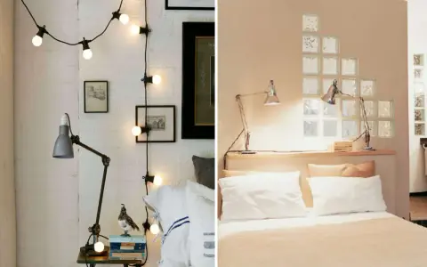 Guirlande lumineuse et lampe d'appoint dans une chambre borgne. Le mur de gauche est en briques blanches, celui de droite est beige avec des carreaux de verre.