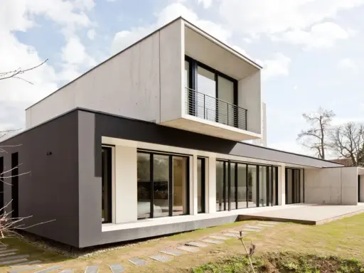 Maison moderne 100m2, béton et anthracite. Le prix maison neuve 100m2 sans terrain est un bon point de départ pour votre projet.