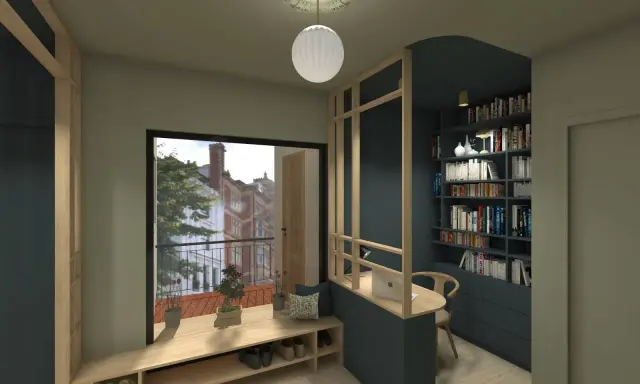 Un bureau caché dans le salon, intégré à une bibliothèque murale. Un espace de travail discret et fonctionnel.