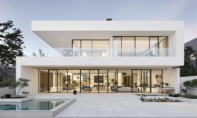 Une maison design moderne avec piscine, de grandes baies vitrées révélant un intérieur lumineux et épuré.