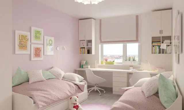 Chambre rose et blanche avec deux lits jumeaux, un bureau et des étagères, idéale pour séparer une chambre en deux.