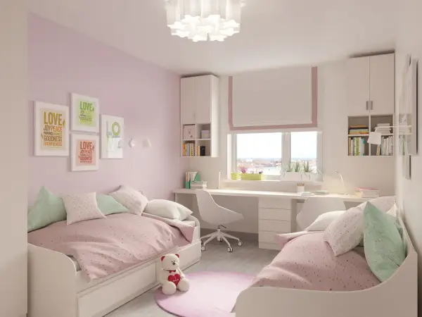 Chambre rose et blanche avec deux lits jumeaux, un bureau et des étagères, idéale pour séparer une chambre en deux.